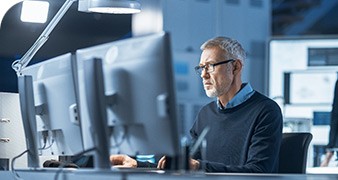Engineer learns to use acoustic test software.